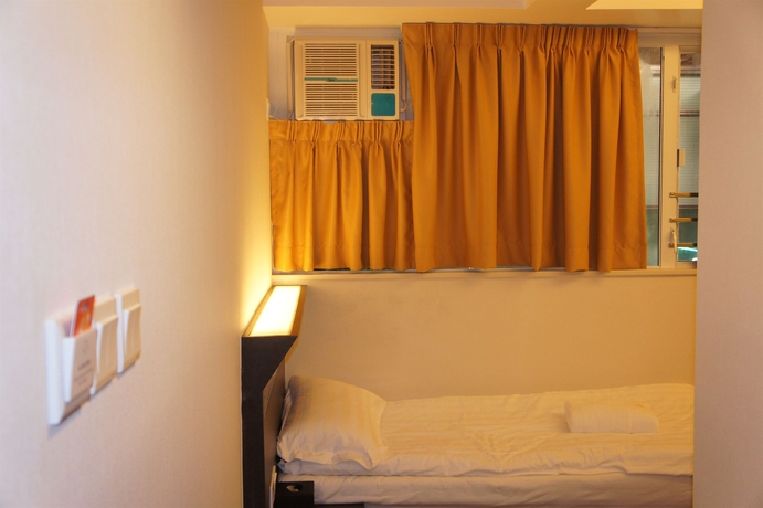 Imagen de la habitación del Hotel Welcome Inn, Tsim Sha Tsui. Foto 9