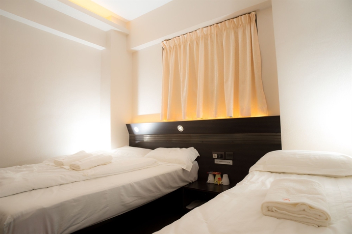 Imagen de la habitación del Hotel Welcome Inn, Tsim Sha Tsui. Foto 11