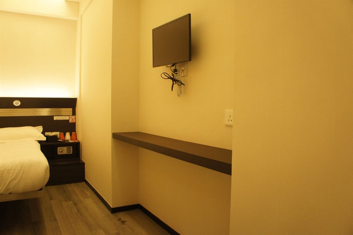 Imagen de la habitación del Hotel Welcome Inn, Tsim Sha Tsui. Foto 12