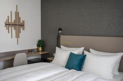 Imagen de la habitación del Hotel Welcome Kronberg Musikquartier. Foto 10