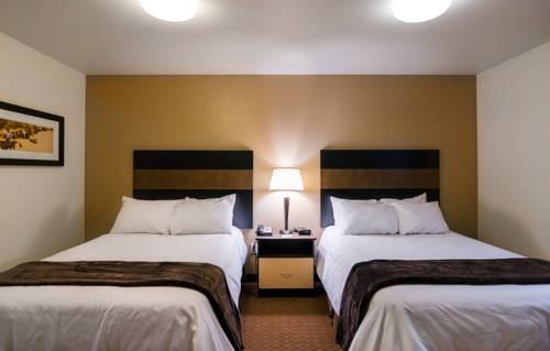 Imagen de la habitación del Hotel Welcome Suites Minot. Foto 2
