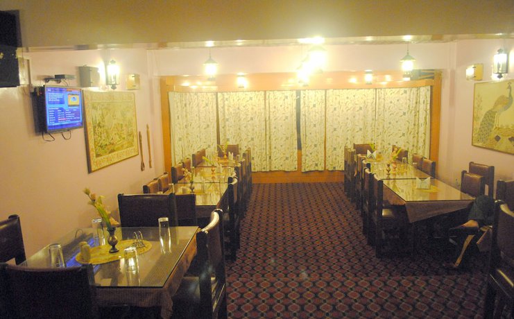 Imagen del bar/restaurante del Hotel Welcome at Gulmarg. Foto 2