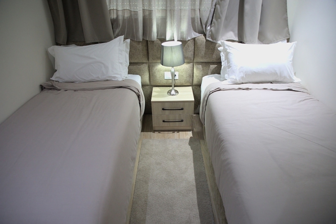 Imagen de la habitación del Hotel Welcomehouse apparthotel. Foto 14