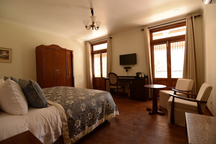 Imagen de la habitación del Hotel Welcomheritage Ashdale. Foto 3