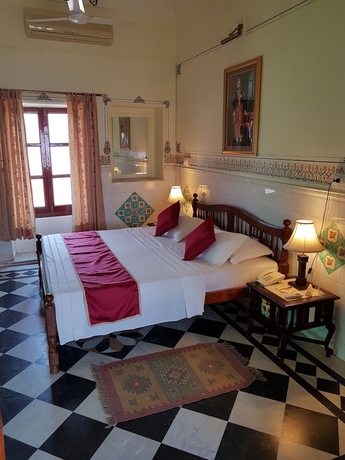 Imagen de la habitación del Hotel Welcomheritage Mandir Palace. Foto 11