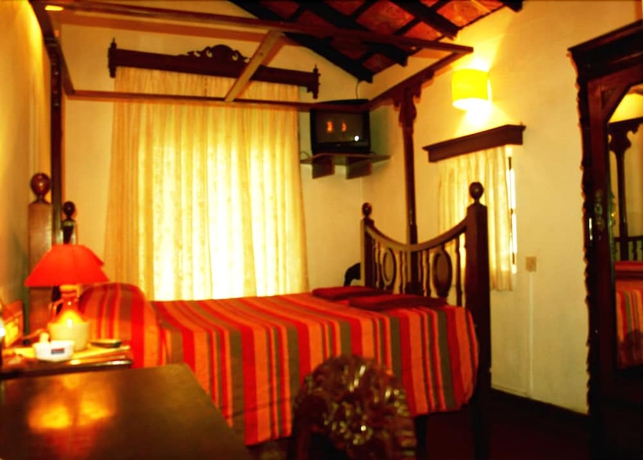 Imagen de la habitación del Hotel Welcomheritage Panjim Pousada. Foto 6
