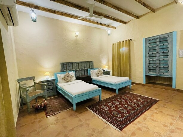 Imagen de la habitación del Hotel Welcomheritage Ranjit Vilas. Foto 18