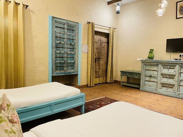Imagen de la habitación del Hotel Welcomheritage Ranjit Vilas. Foto 19