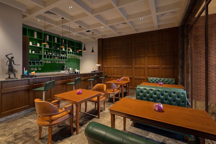 Imagen del bar/restaurante del Hotel Welcomhotel By ITC Hotels Jim Corbett. Foto 4