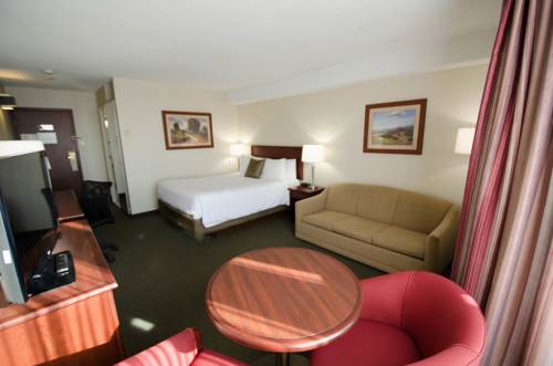 Imagen de la habitación del Hotel Welcominns. Foto 8