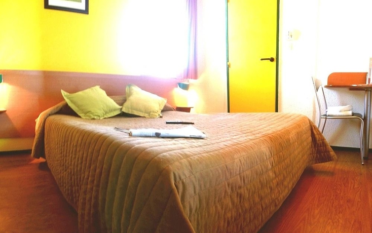 Imagen de la habitación del Hotel Welcomotel. Foto 11
