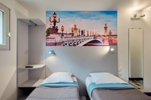 Imagen de la habitación del Hotel Welcomotel Les Mureaux. Foto 6