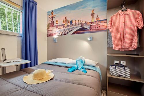 Imagen de la habitación del Hotel Welcomotel Les Mureaux. Foto 8