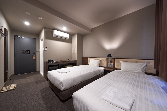 Imagen de la habitación del Hotel Welina Premier Shinsaibashi. Foto 2
