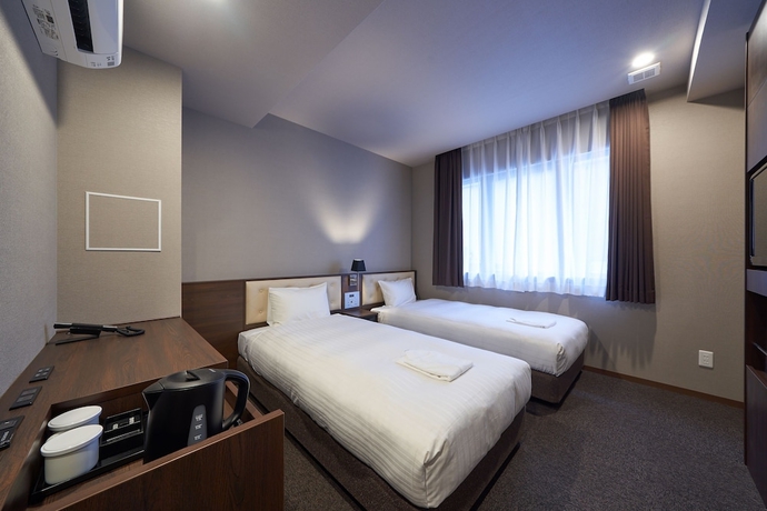 Imagen de la habitación del Hotel Welina Premier Shinsaibashi. Foto 3