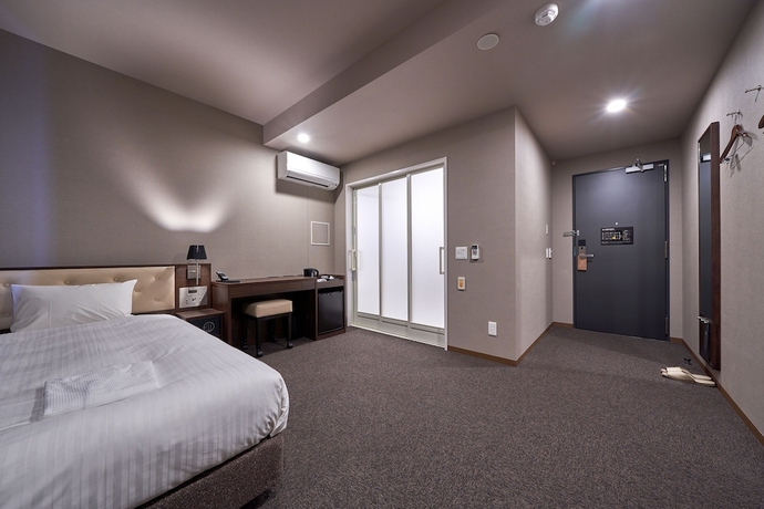 Imagen de la habitación del Hotel Welina Premier Shinsaibashi. Foto 4
