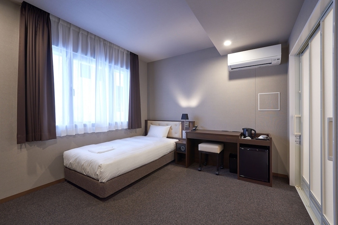 Imagen de la habitación del Hotel Welina Premier Shinsaibashi. Foto 5