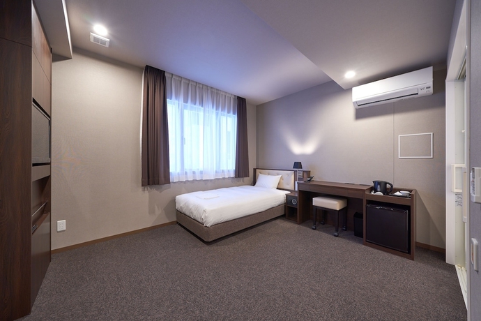 Imagen de la habitación del Hotel Welina Premier Shinsaibashi. Foto 11