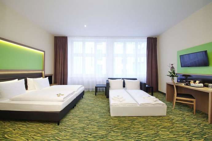 Imagen de la habitación del Hotel Well. Foto 15