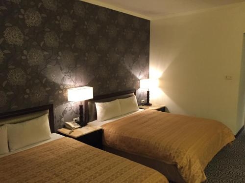 Imagen de la habitación del Hotel Well Garden. Foto 8