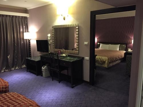 Imagen de la habitación del Hotel Well Garden. Foto 10