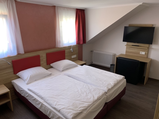 Imagen de la habitación del Hotel Well Garni. Foto 10