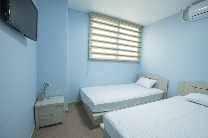 Imagen de la habitación del Hotel Well Plus Bnb Guest House. Foto 2