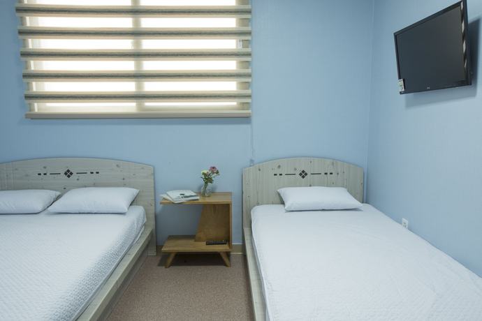 Imagen de la habitación del Hotel Well Plus Bnb Guest House. Foto 6