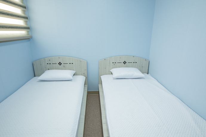Imagen de la habitación del Hotel Well Plus Bnb Guest House. Foto 9