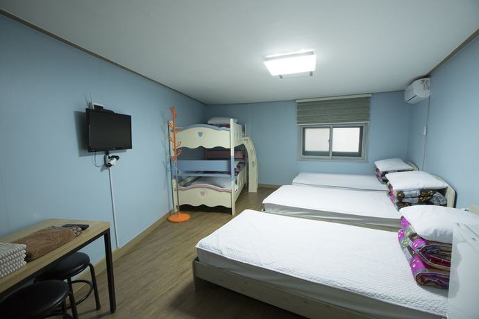 Imagen de la habitación del Hotel Well Plus Bnb Guest House. Foto 11