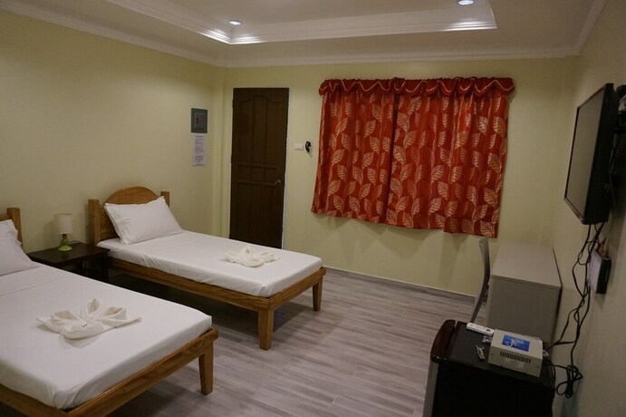 Imagen de la habitación del Hotel Wellbeach Dive Resort. Foto 14