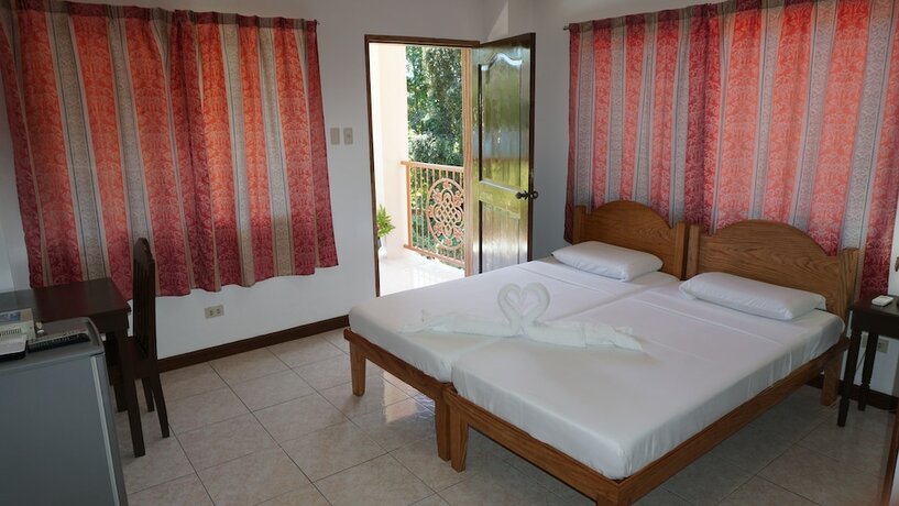 Imagen de la habitación del Hotel Wellbeach Dive Resort. Foto 15