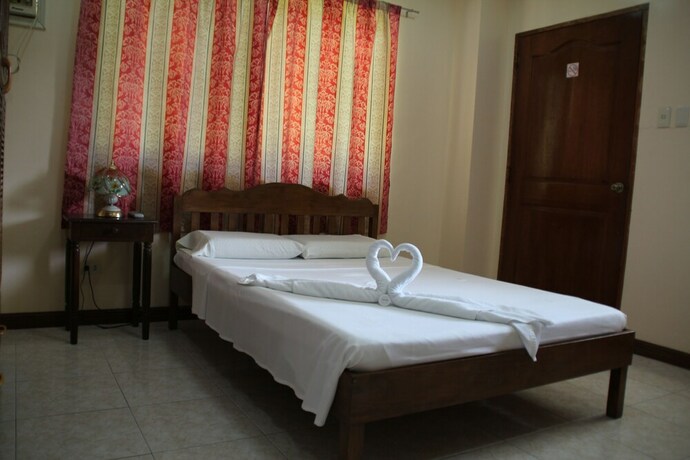 Imagen de la habitación del Hotel Wellbeach Dive Resort. Foto 17