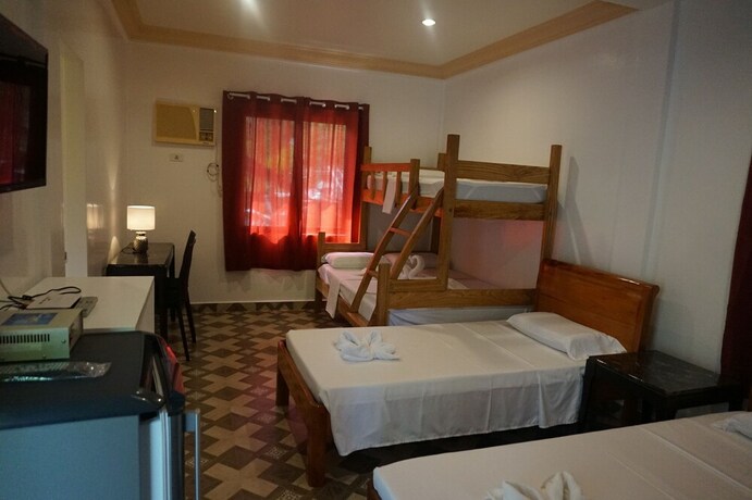 Imagen de la habitación del Hotel Wellbeach Dive Resort. Foto 19