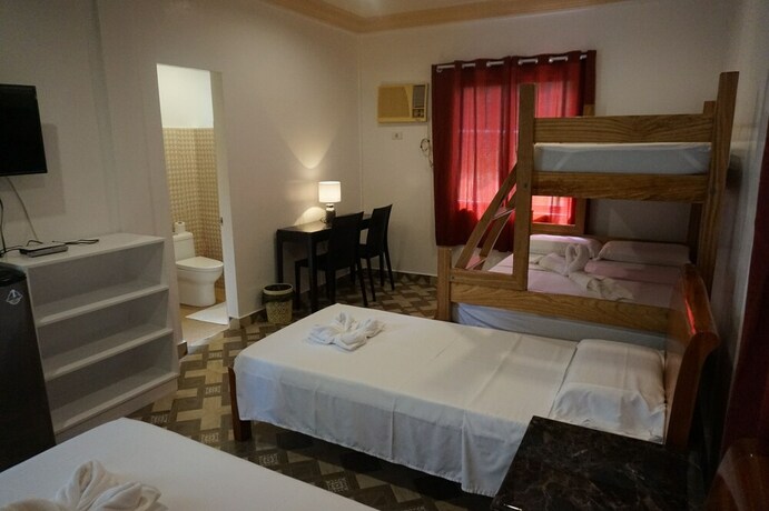 Imagen de la habitación del Hotel Wellbeach Dive Resort. Foto 20