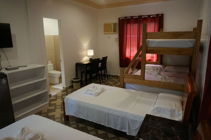Imagen de la habitación del Hotel Wellbeach Dive Resort. Foto 21