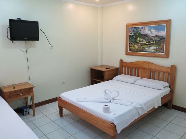 Imagen de la habitación del Hotel Wellbeach Dive Resort. Foto 25
