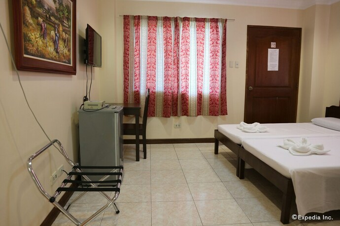 Imagen de la habitación del Hotel Wellbeach Dive Resort. Foto 28