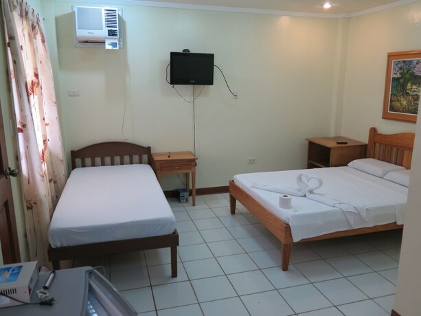Imagen de la habitación del Hotel Wellbeach Dive Resort. Foto 30