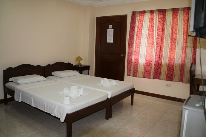 Imagen de la habitación del Hotel Wellbeach Dive Resort. Foto 31