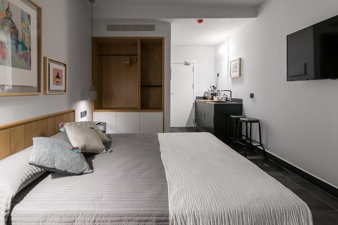 Imagen de la habitación del Hotel Welldone Antiquarium. Foto 2