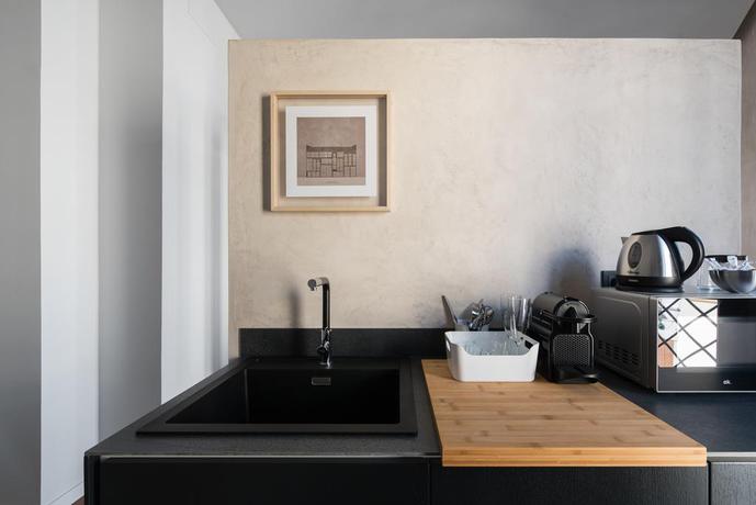 Imagen de la habitación del Hotel Welldone Antiquarium. Foto 6