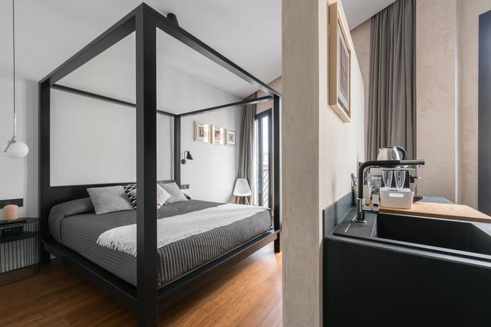 Imagen de la habitación del Hotel Welldone Antiquarium. Foto 7