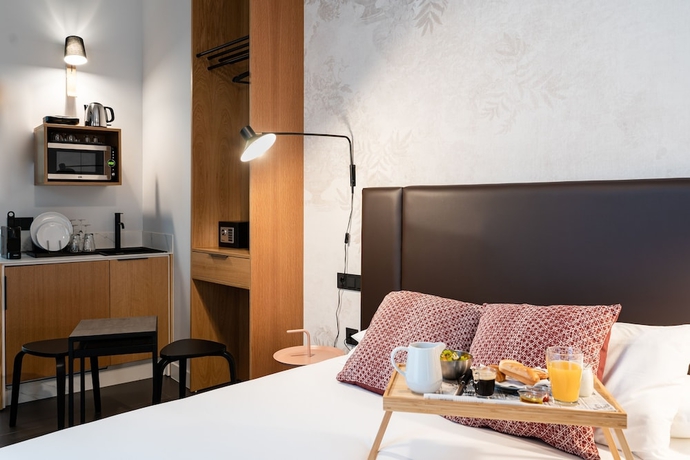 Imagen de la habitación del Hotel Welldone Quality - Crystal Pool. Foto 11