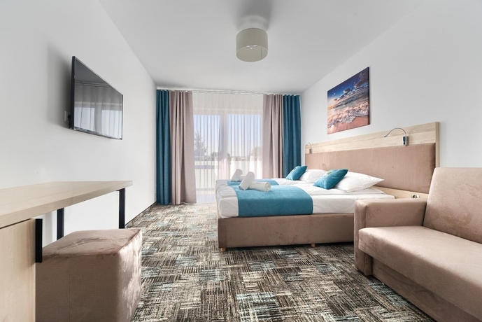 Imagen de la habitación del Hotel Welle Resort. Foto 7