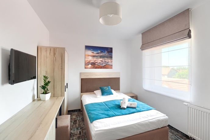 Imagen de la habitación del Hotel Welle Resort. Foto 8