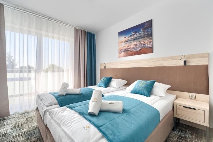 Imagen de la habitación del Hotel Welle Resort. Foto 13