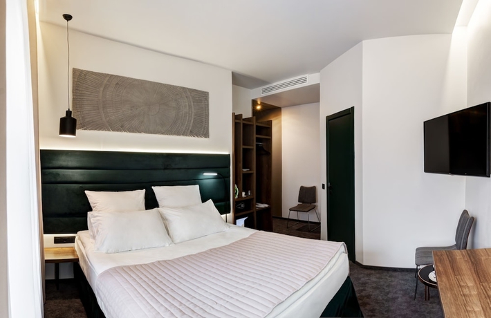 Imagen de la habitación del Hotel Wellion Suharevskiy. Foto 4