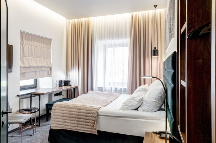 Imagen de la habitación del Hotel Wellion Suharevskiy. Foto 5