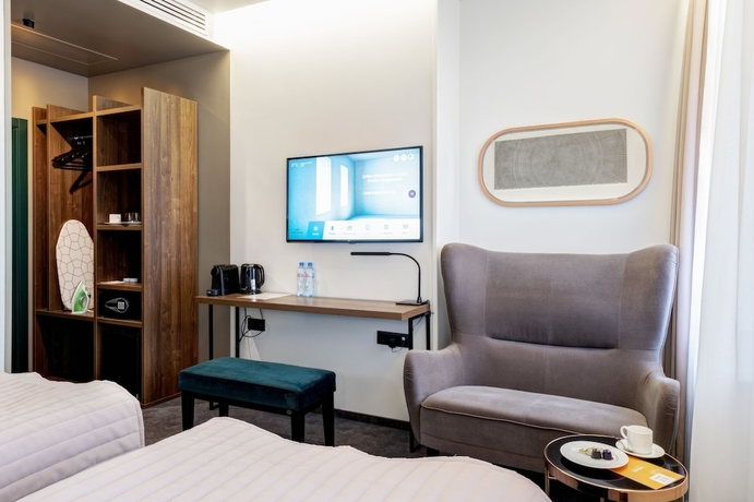 Imagen de la habitación del Hotel Wellion Suharevskiy. Foto 7